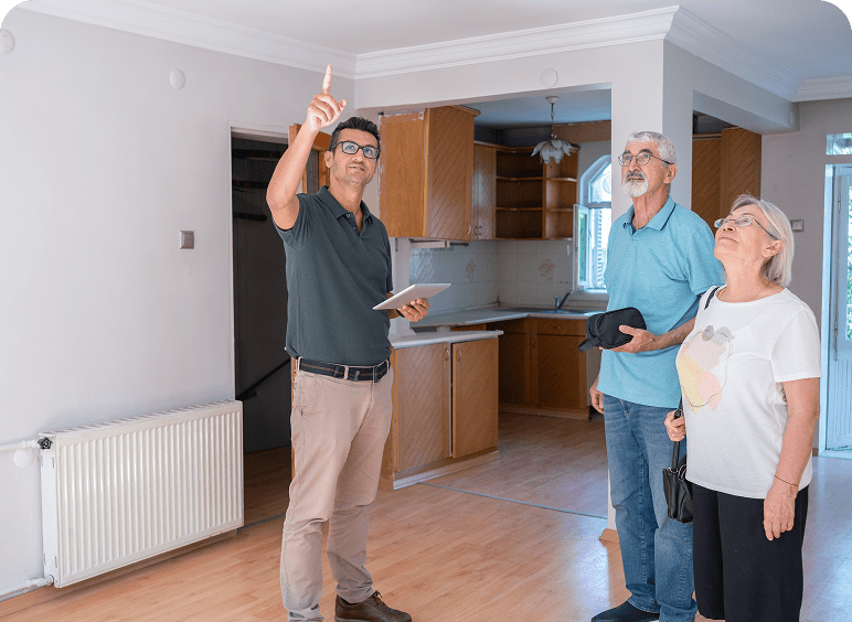 Realtor showing house to interested couple.